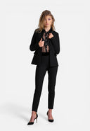 pantalon noire , pantalon en laine , pantalon finition en velours