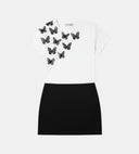 T-shirt blanc ANI ARPÉ en coton avec papillons noirs en relief sur l'épaule et jupe noire assortie