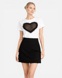 ANI ARPÉ white cotton t-shirt with black tulle heart applique and ruffled trim.