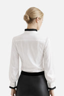 ANI ARPÉ white 100% cotton long-sleeve blouse with pleated collar and cuffs, pearl buttons, and removable bow.
